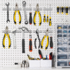 Various tools organized on a pegboard using long rectangular neodymium magnets for tool storage.